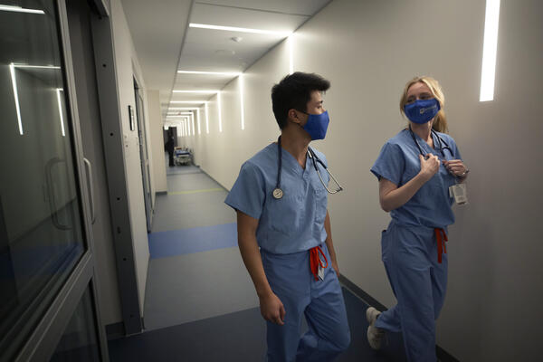 residents walking down the hallway