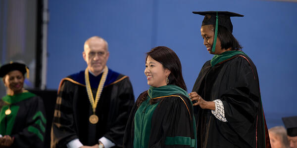 person getting hooded