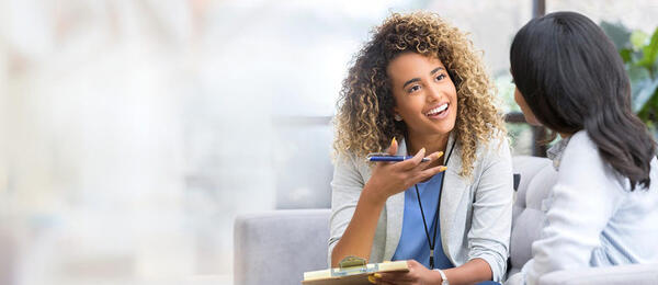 two women talking stock image